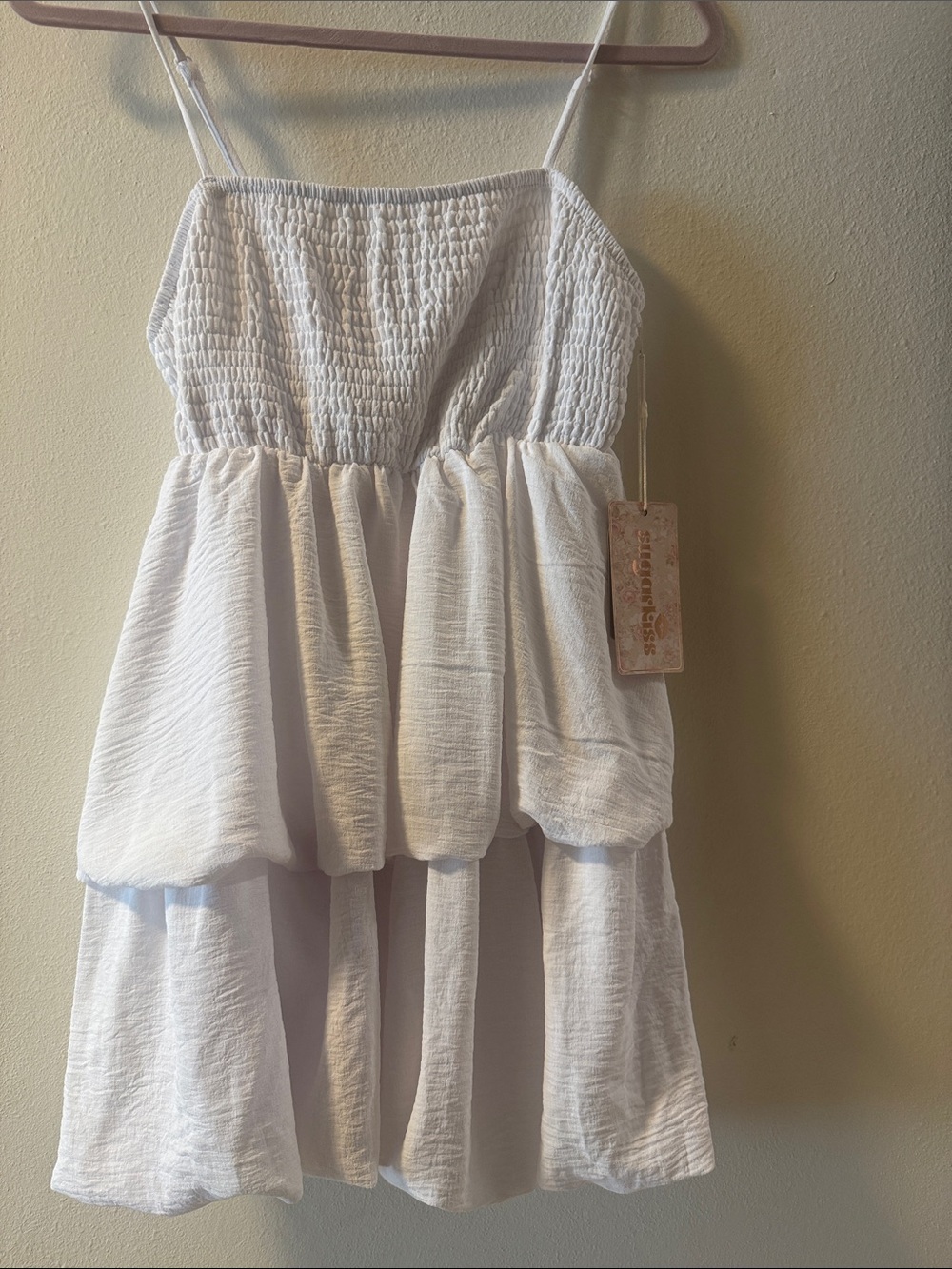 Sleeveless Smocked Tiered Mini Dress in Cream